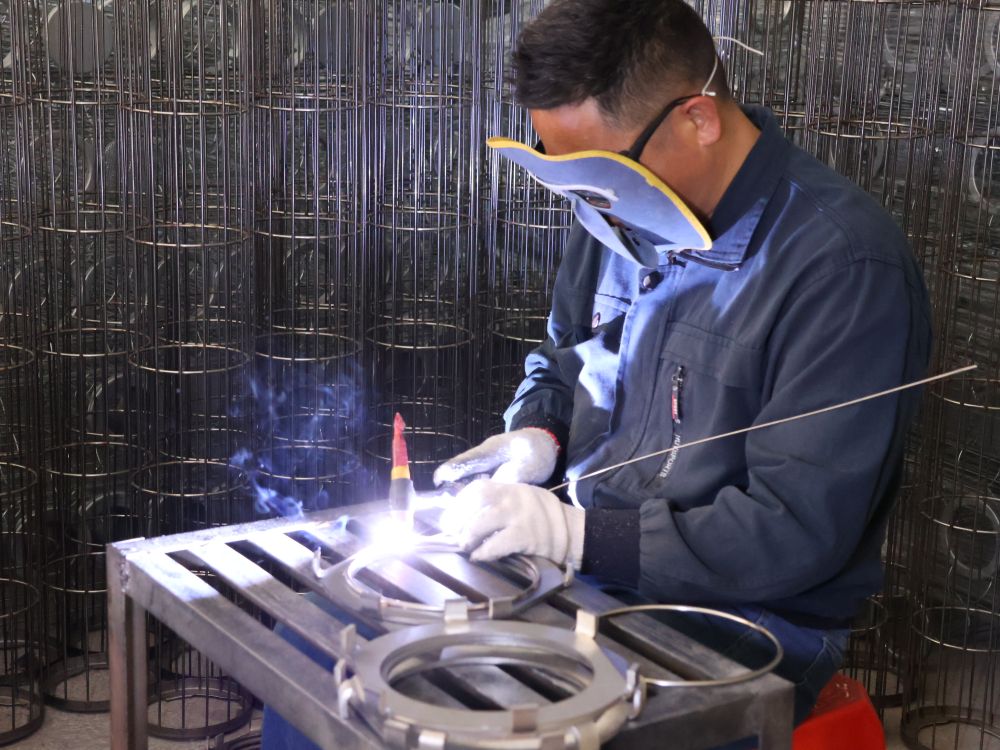 Dust collector cage welding