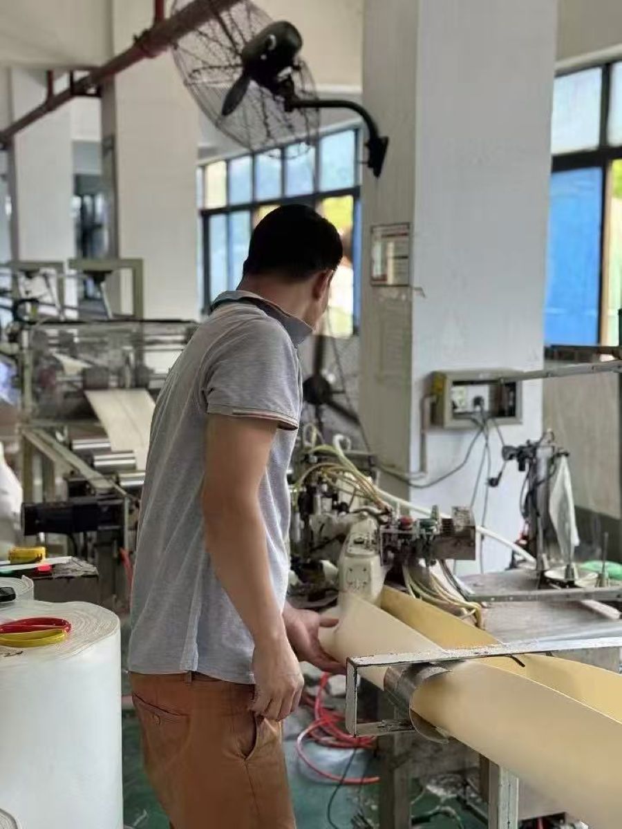 Automatic dust filter bag production equipment